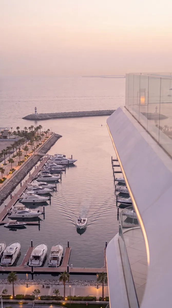 Samar Residences, the marina from above, a boat heading out between the yachts